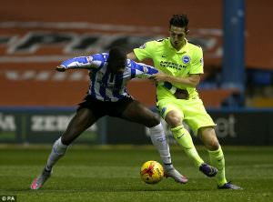 Lewis Dunk battles for the ball in the 0-0 draw with Sheffield Wednesday