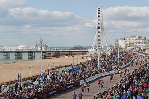 Thousands of locals flock to the seafront to cheer on runners
