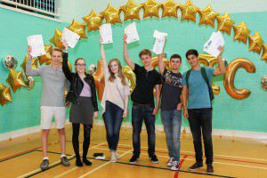 Students celebrate an incredible A-level pass rate of 99.1% at Bhasvic. 