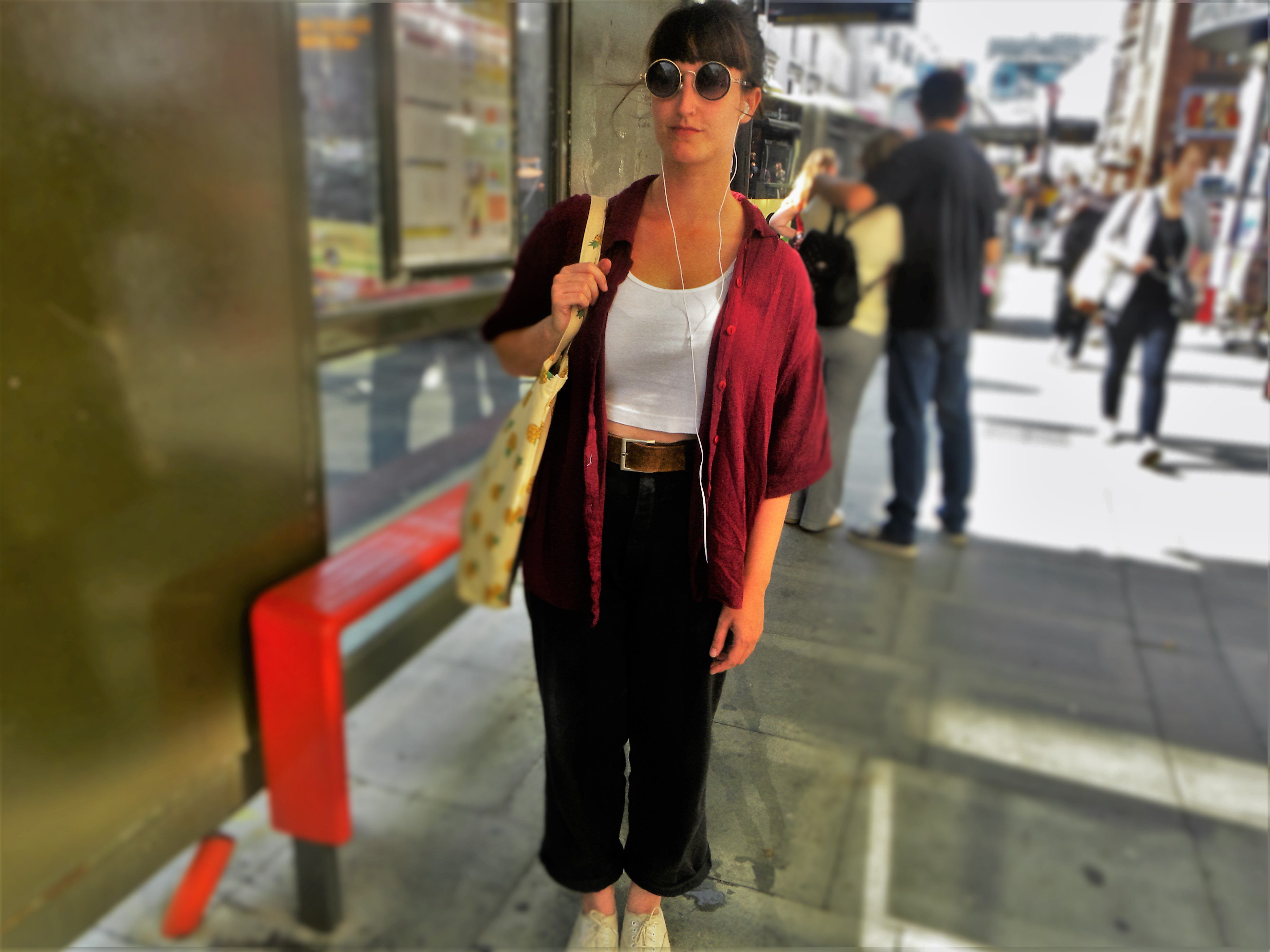 Amy is wearing a top from Top Shop, jeans and belt from a Charity Shop, shoes from To be Worn Again and bag from Tiger.