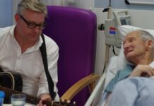 What it’s Like to Brighten Dementia Wards by Sharing Christmas Songs Russ Callaghan with a patient