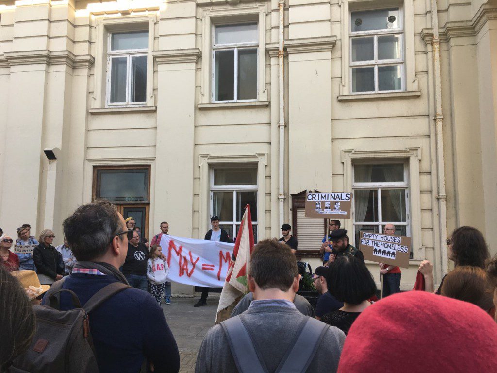 Supporters brought banners reading "May is murder" and "People not property". Credit @ Stephanie Newton