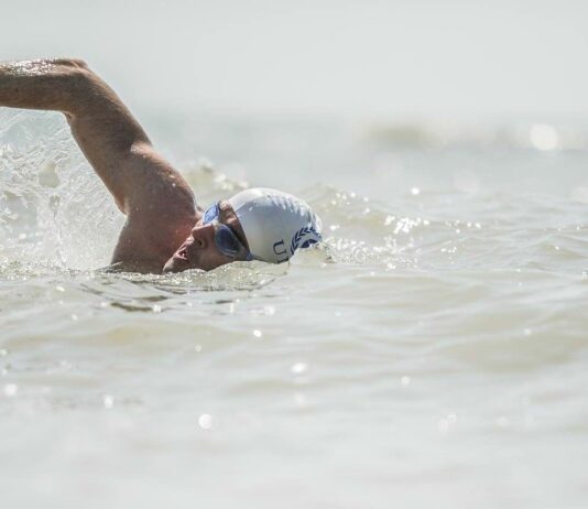The Long Swim: Endurance Swimmer’s Brighton Stop Inspires Community Beach Clean