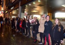 Animal rights protesters hold demonstration in steakhouse restaurant in Brighton