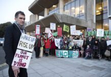 Can Brighton become carbon neutral? Green Couuncillor Ollie Sykes protesting with Extinction Rebellion campaigners and members of the Green Group