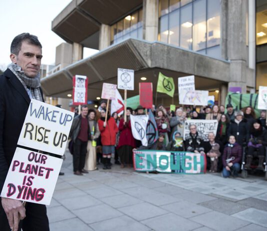 Can Brighton become carbon neutral? Green Couuncillor Ollie Sykes protesting with Extinction Rebellion campaigners and members of the Green Group