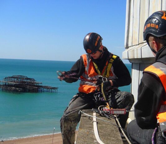 Abseiling cleaners swoop in to save the day