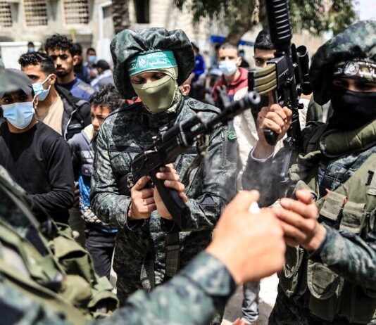 How can Israel and Hamas be stopped from committing war crimes