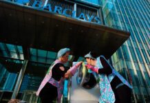 Extinction Rebellion protestors gather outside Barclays