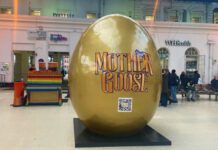 A Giant Golden Egg arrives at Brighton Station