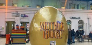 A Giant Golden Egg arrives at Brighton Station