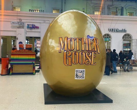 A Giant Golden Egg arrives at Brighton Station
