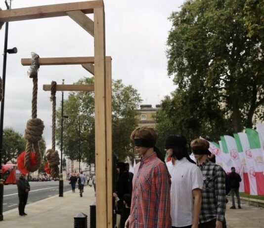 Iran executes first protester quesrtions its human rights abuses