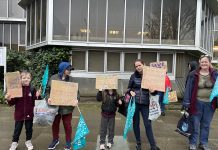 Educators and parents protested against council school closure proposals outside Hove Town Hall on Thursday