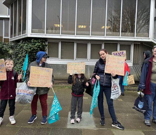 Educators and parents protested against council school closure proposals outside Hove Town Hall on Thursday