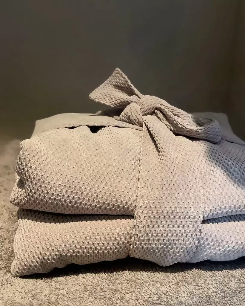 Soft waffle robe, slippers and towels at The Hideaway Brighton spa