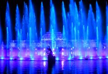Christmas at Kew 2026: Exciting New Light Trail Opens 13 November Christmas at Kew light trail installation" / "Christmas at Kew Palm House Pond fountain display"
