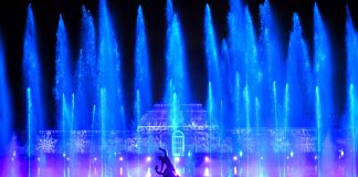 Christmas at Kew 2026: Exciting New Light Trail Opens 13 November Christmas at Kew light trail installation" / "Christmas at Kew Palm House Pond fountain display"